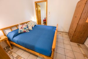 Appartamento 3 - Camera con Letto Blu - Agriturismo Poggio al Pino Toscana